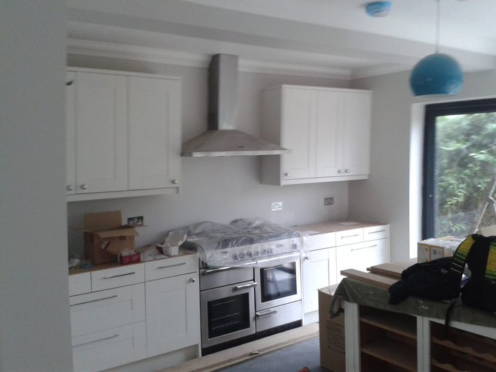 Bright kitchen with freshly finished walls and cabinetry