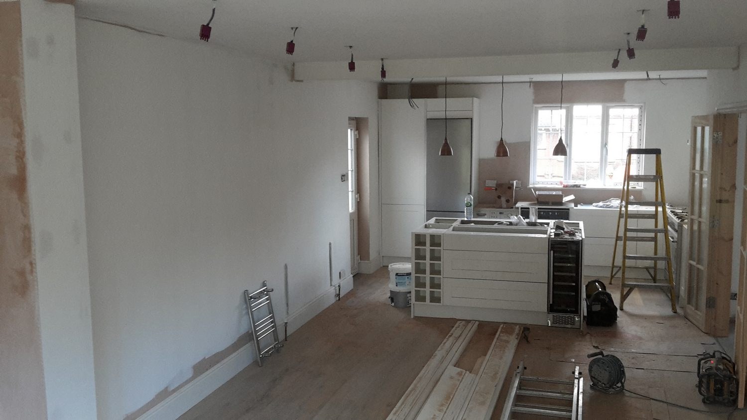 Room prepared for decorating with floors and fittings protected